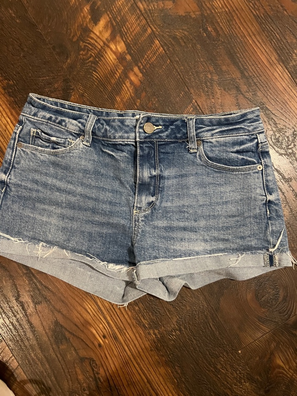 PAIGE Medium Blue Rolled Hem Denim Shorts